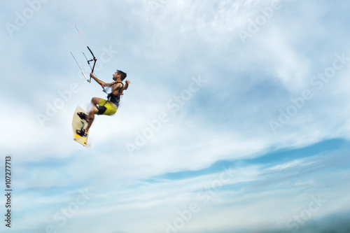 Surfer flying through the sky