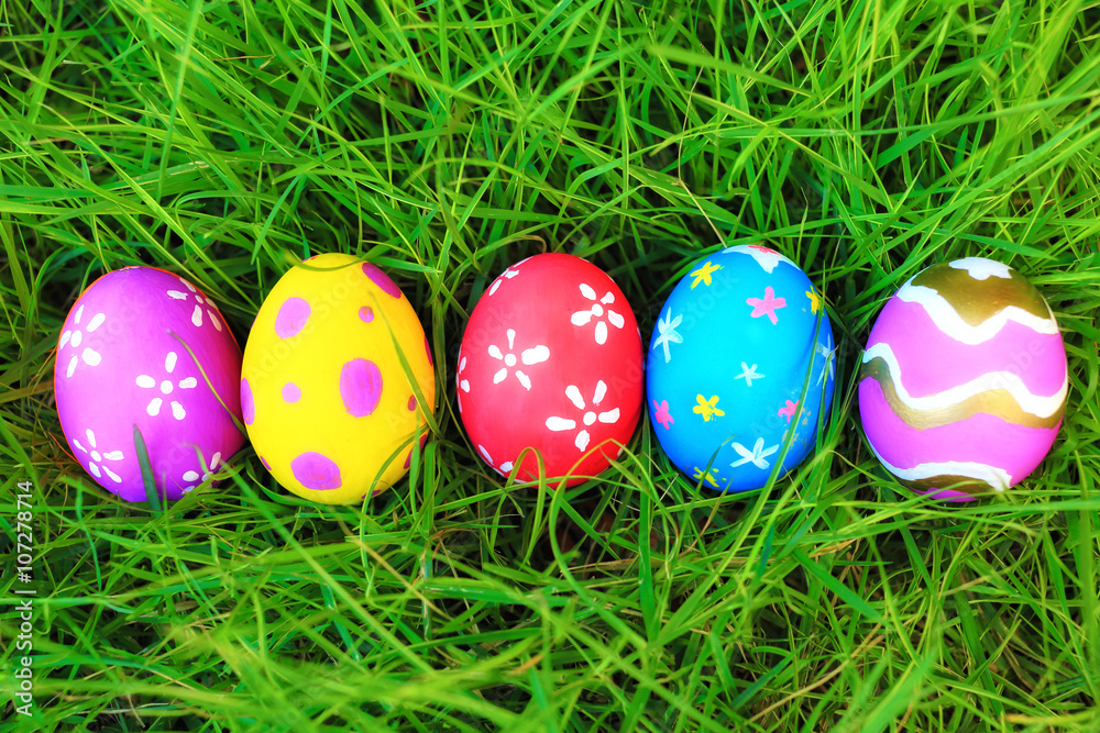 easter eggs on green grass