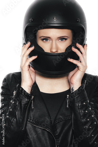 portrait of young beautiful woman in biker helmet © Kaponia Aliaksei