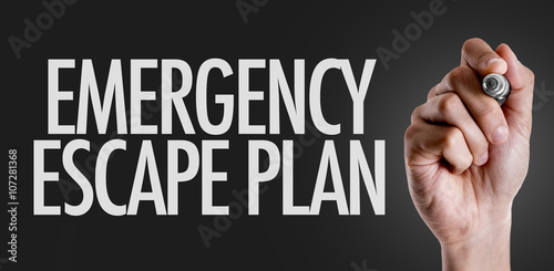 Hand writing the text: Emergency Escape Plan
