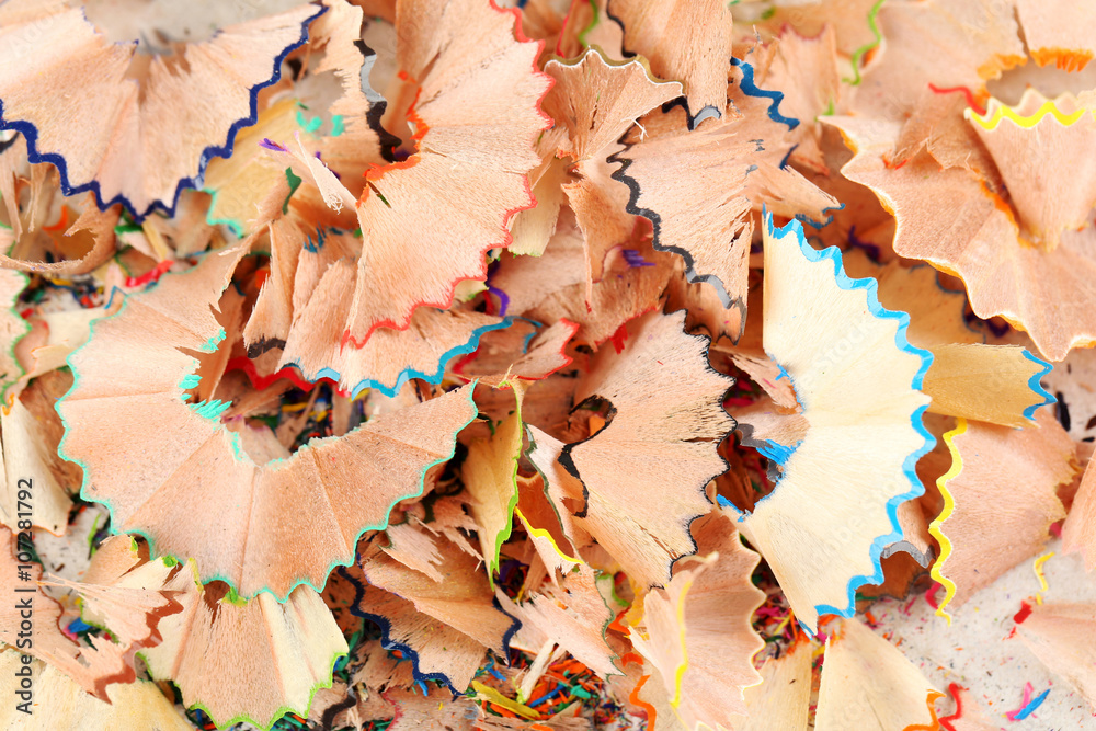 Drawing colourful pencils shavings background, close up