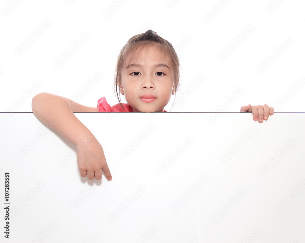 Little girl pointing an empty banner blank sheet of paper isolat Little girl pointing an empty banner blank sheet of paper isolat