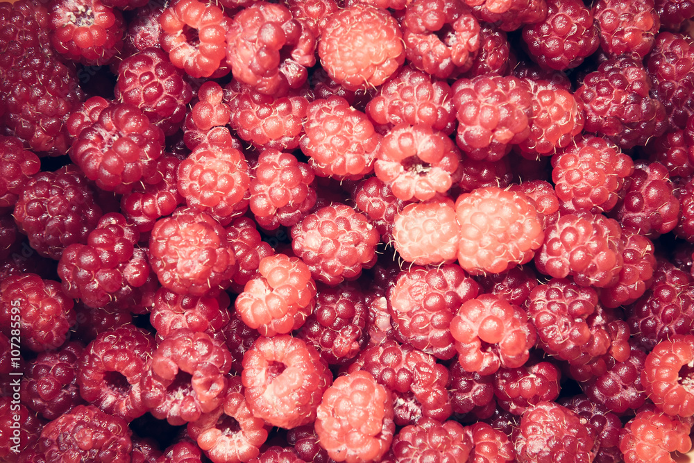 Glamour background with delicious berries. Crop of raspberries Glamour background with delicious berries. Crop of raspberries