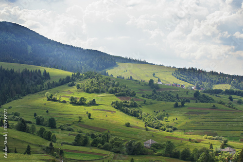 sunlight and shadows in green mountain village
