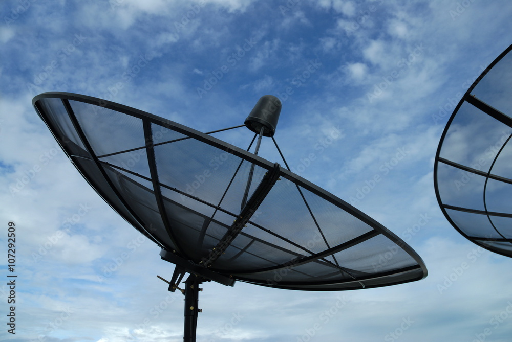 Satellite dish on blue sky with cloud Satellite dish on blue sky with cloud