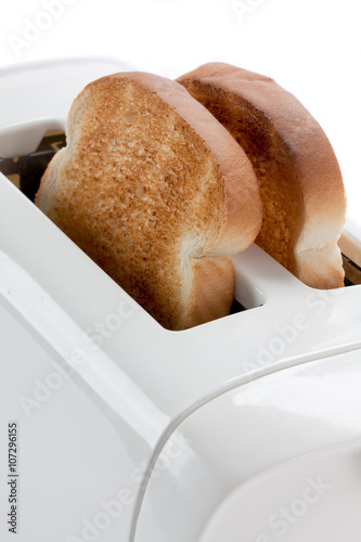bread toast in toaster.