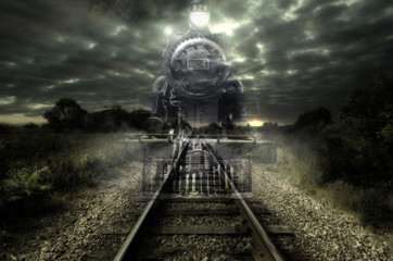 Fotobehang Trein Spookachtige stoomlocomotief tussen begroeiing  © michelaubryphoto