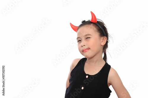 Scary cute little asian girl in black Halloween costume