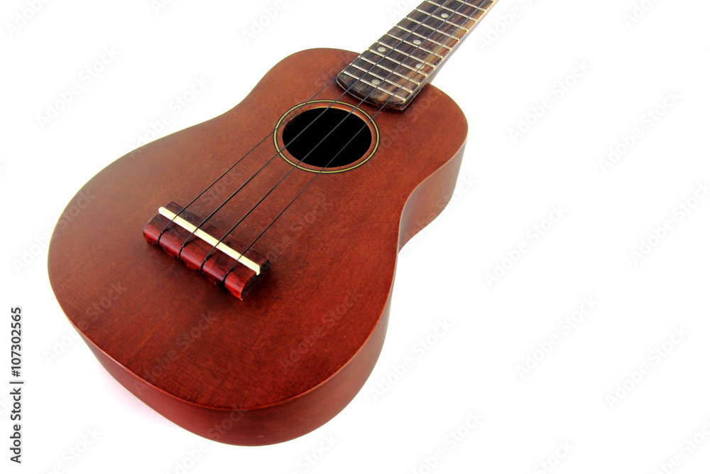Fototapeta premium Vintage closeup ukulele on white isolated.