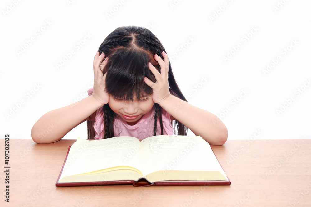 serious little girl reading a book serious little girl reading a book