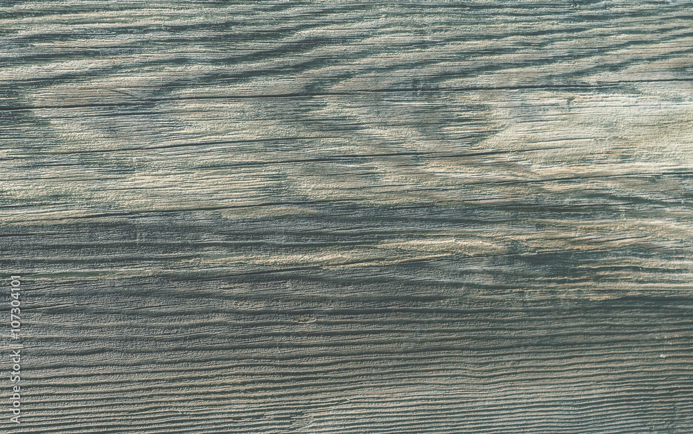 Fototapeta premium pale brown-green wooden surface
