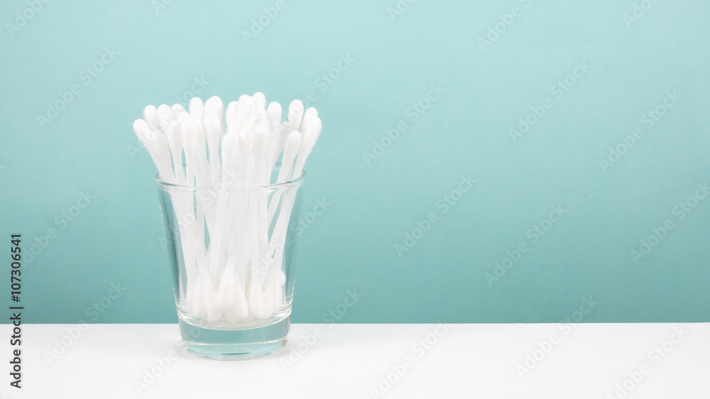 The group of purified white cotton buds in shot glass. The group of purified white cotton buds in shot glass.