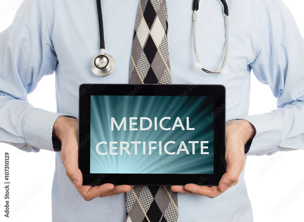 Doctor holding tablet - Medical certificate Doctor holding tablet - Medical certificate