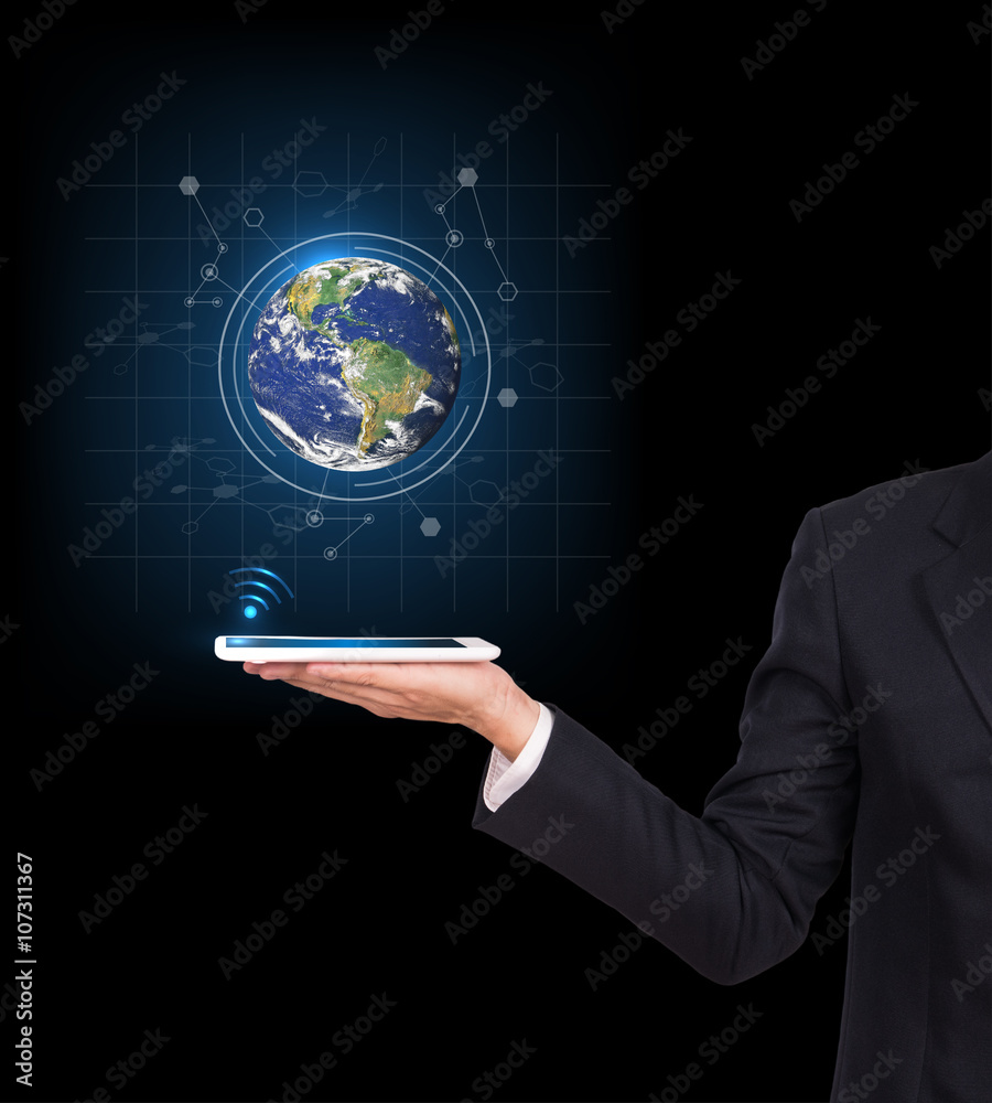 Businessman hands holding tablet with Earth planet. Elements of Businessman hands holding tablet with Earth planet. Elements of