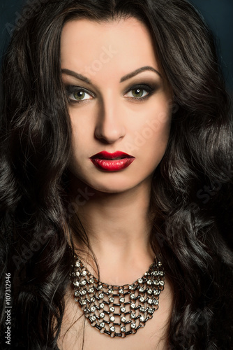 Fototapeta Naklejka Na Ścianę i Meble -  sensual brunette with ombre red lips portrait