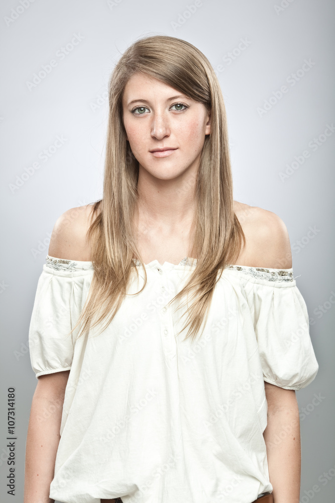 beautiful young blonde girl portrait in a interior background beautiful young blonde girl portrait in a interior background