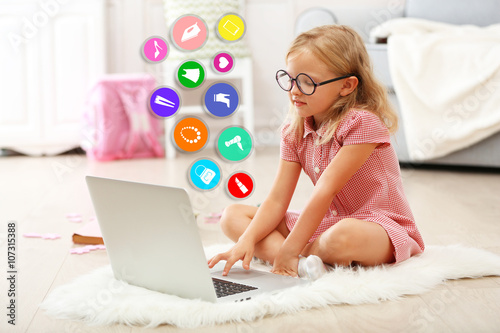 Online shopping. Little gir...