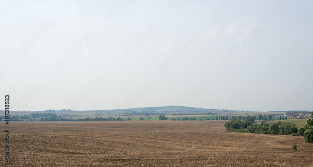 Fields with village