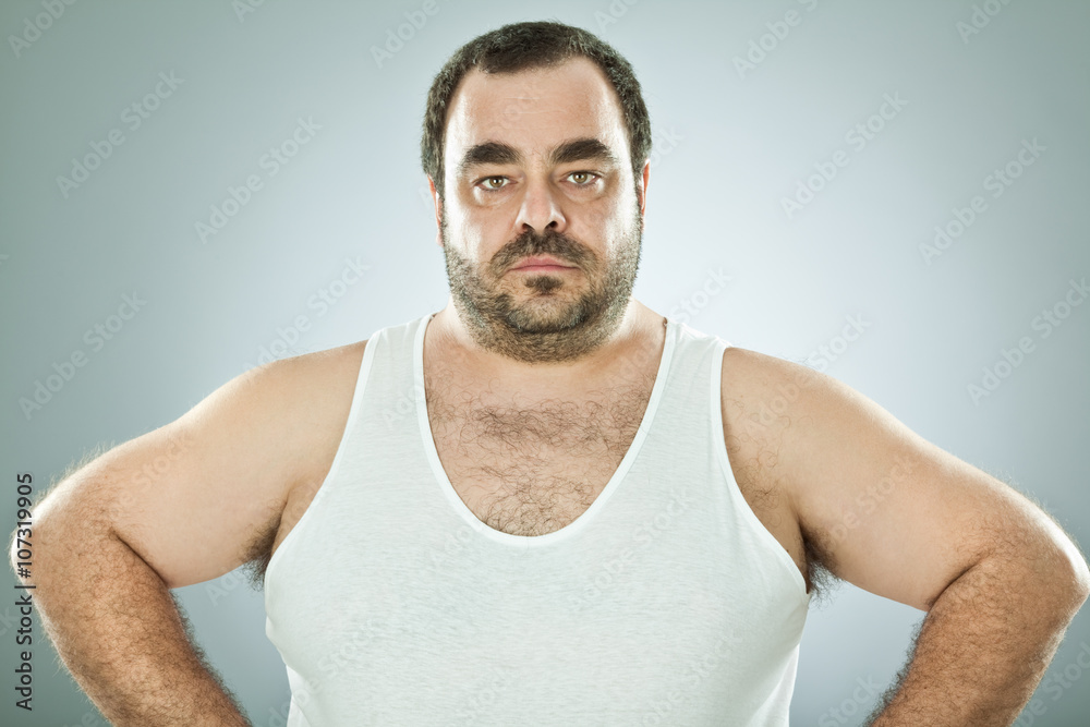 © ZoneCreative - funny fat macho man isolated on grey © ZoneCreative - funny fat macho man isolated on grey