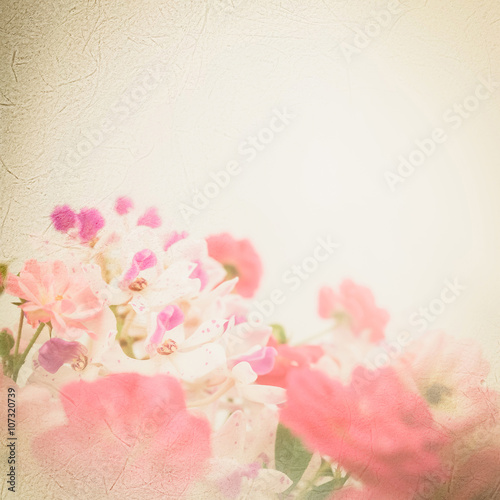 sweet pink roses in soft color on mulberry paper texture for romantic background