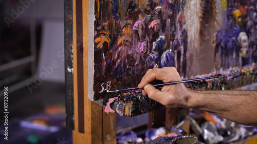 Painter artist signing finished oil canvas set