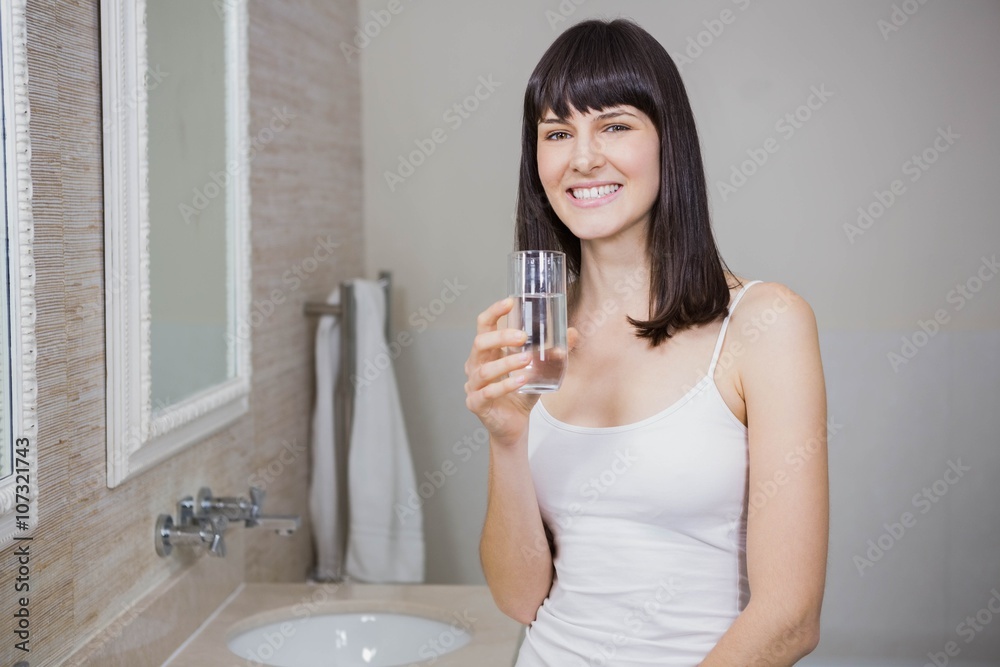 Beautiful woman holding glass of water Beautiful woman holding glass of water