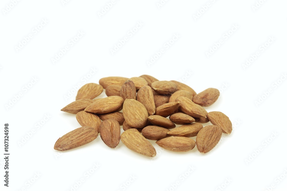 Heap of almonds, on white background. Heap of almonds, on white background.