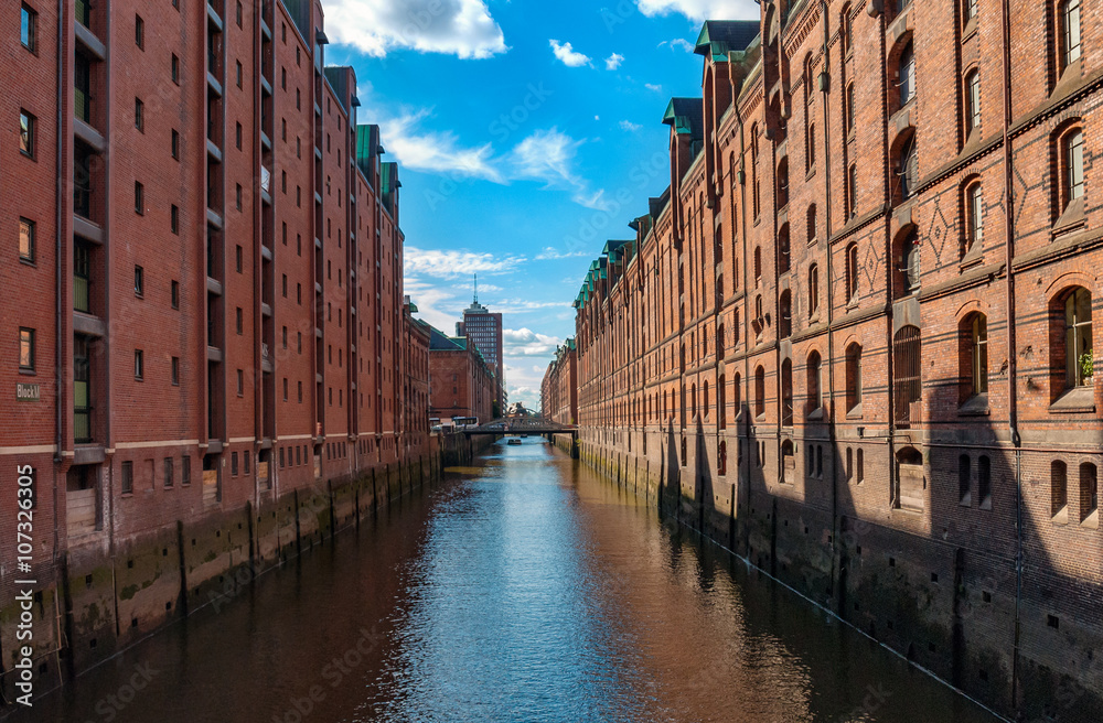 Naklejka premium Hamburg old trading building and storehouses in Speicherstadt, part of Hafen City. Hamburg, Germany