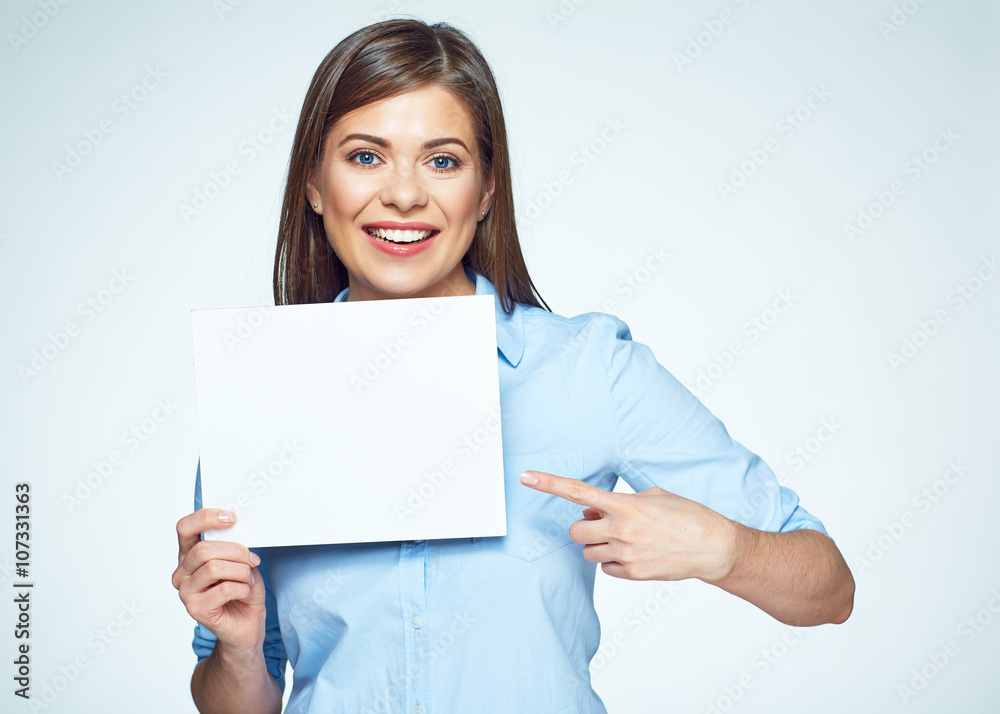 Business woman finger pointing on white sign board Business woman finger pointing on white sign board