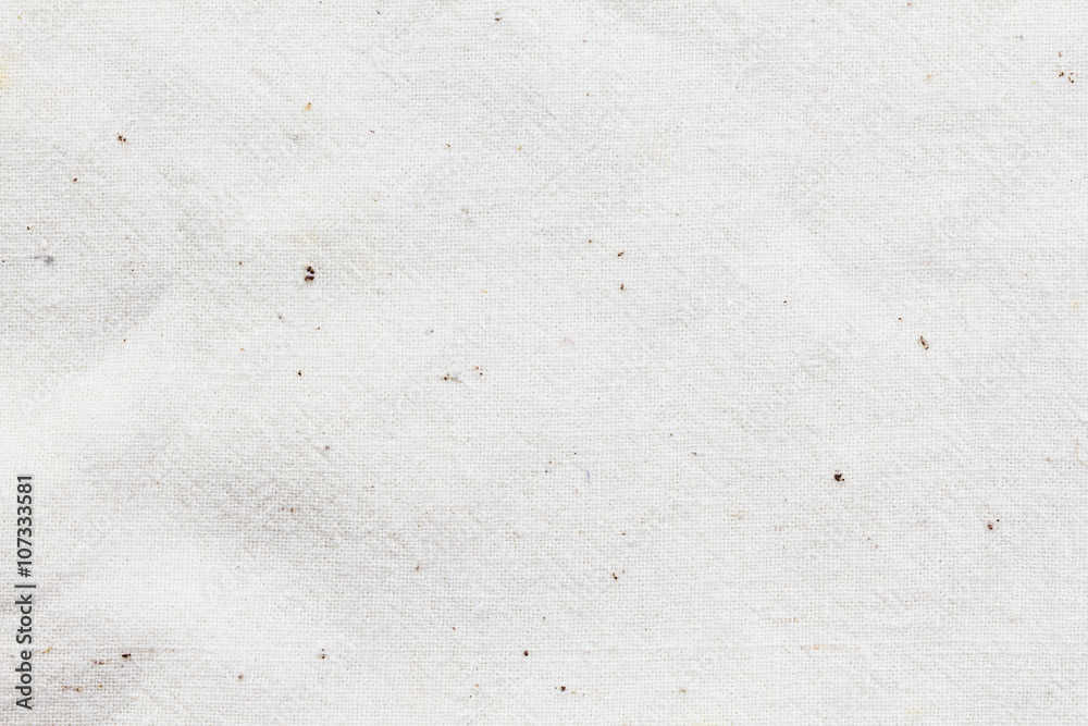Fototapeta premium White textile textured background with dots