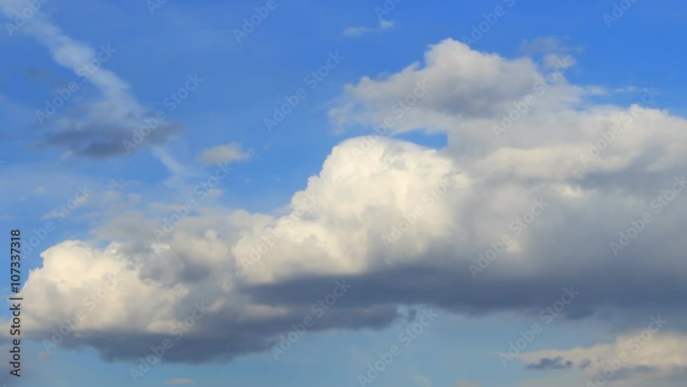 Timelapse white clouds on the blue background Timelapse white clouds on the blue background