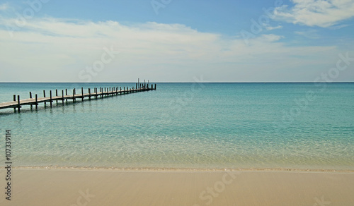wooden jetty on sunny beach © leisuretime70
