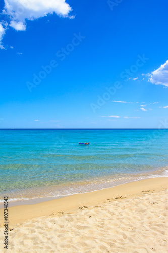 Old man relaxing into the sea