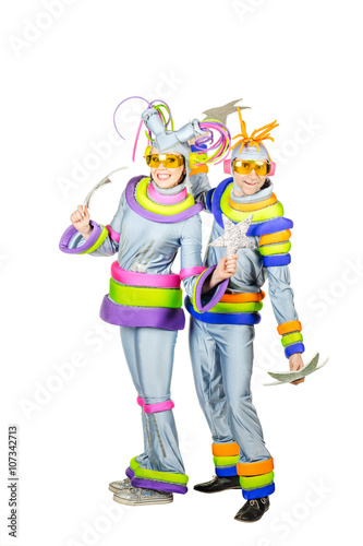 Fancy Dress Party. Two joyful clown with Futuristic Yellow Glas