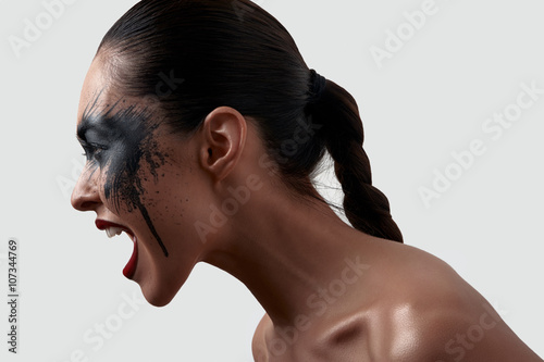 Screaming beauty Model with American Indian Makeup