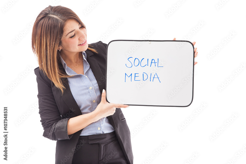 Businesswoman with a SOCIAL MEDIA sign Businesswoman with a SOCIAL MEDIA sign