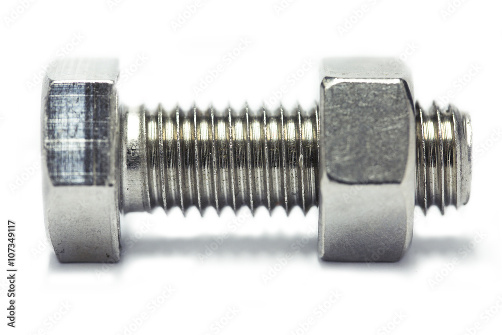 Bolts and nut isolate on white background, Machine equipment in industry job, industry background. Bolts and nut isolate on white background, Machine equipment in industry job, industry background.