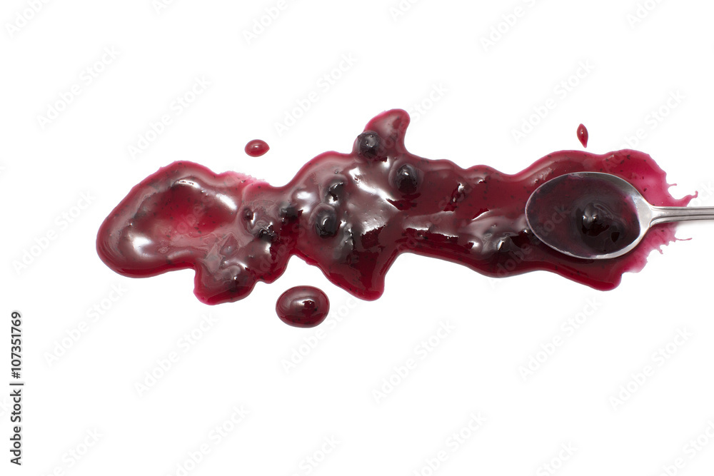 splashes, droplets and spilled blueberry jam with a spoon. Blot the ...