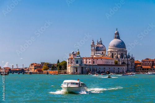 The iconic Grand Canal in Venice, busy with tourists and tourboats.  photo