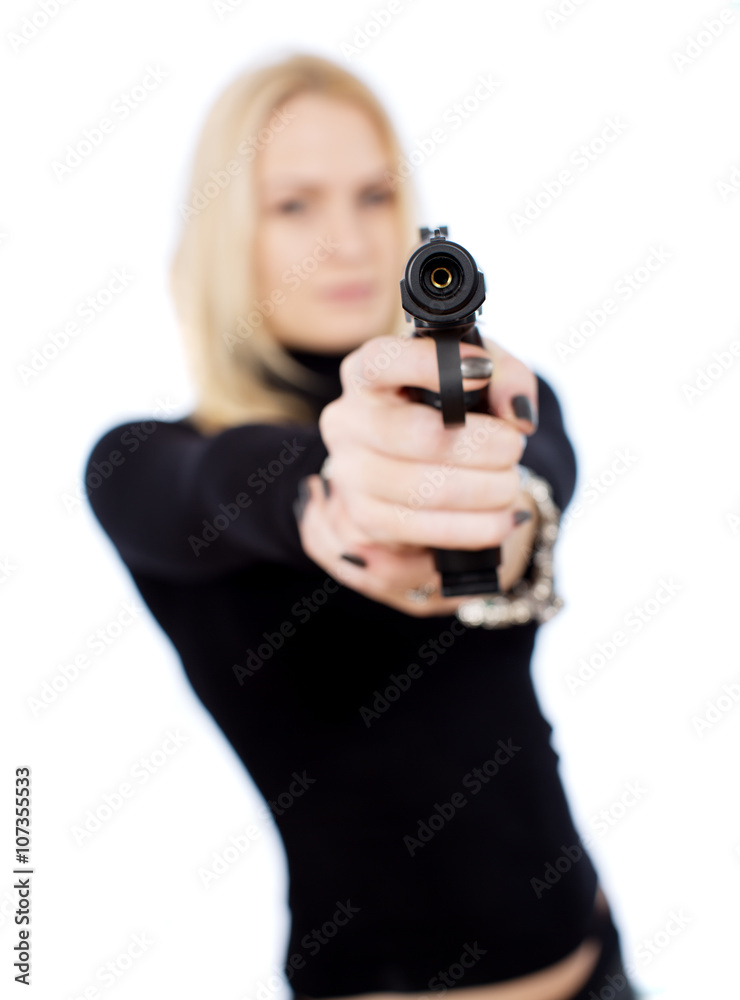 Female secret service agent in sunglasses with gun Female secret service agent in sunglasses with gun