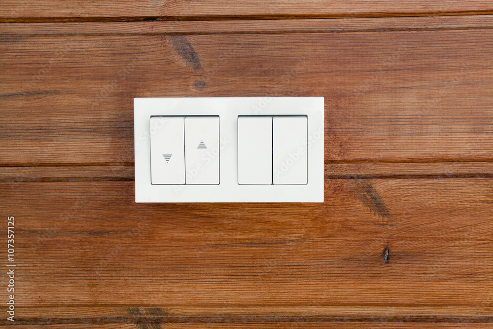 Closeup of wooden wall with light switch Closeup of wooden wall with light switch