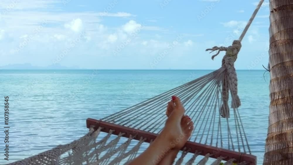 Woman relaxing on the hammock