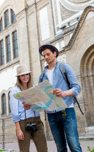 Tourists sightseeing city with map © Stock Rocket