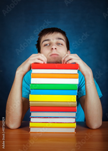 Tired Student with a Books