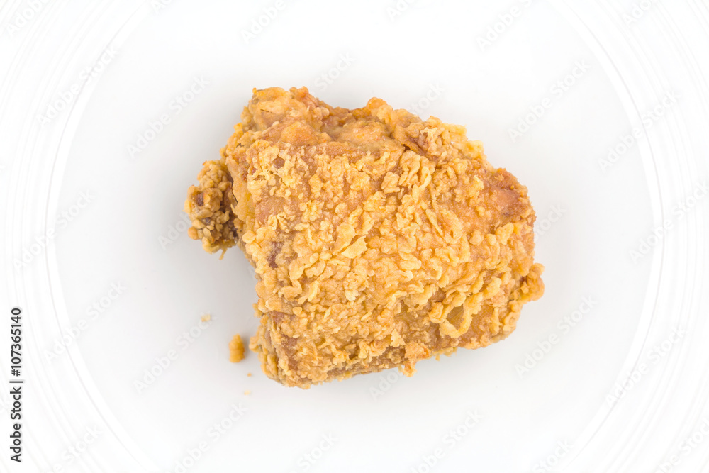 Fried chicken in white plate,top view on isolate Fried chicken in white plate,top view on isolate