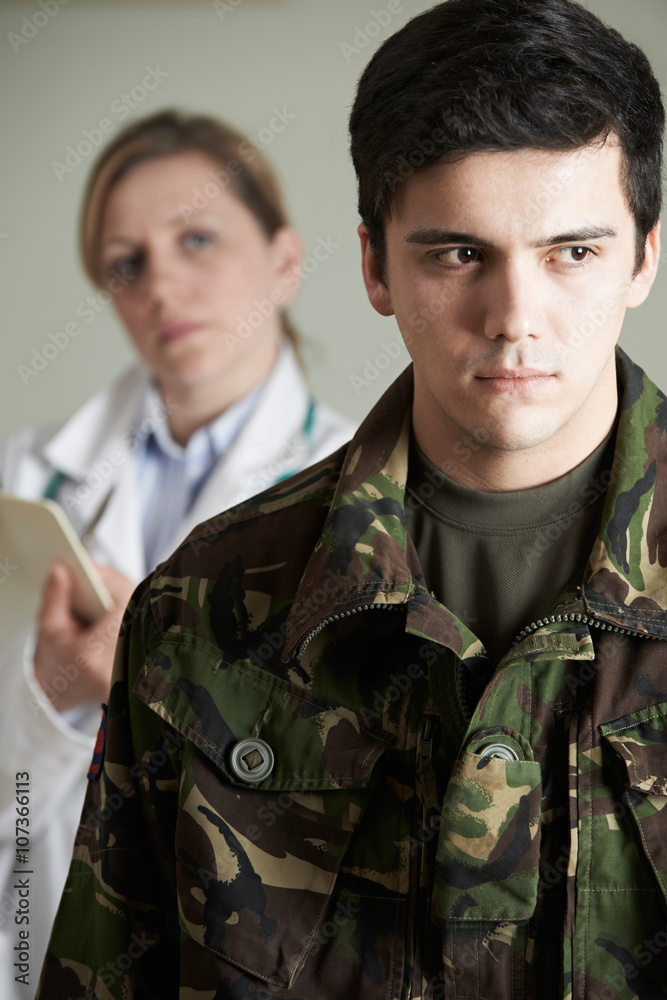 Soldier Being Assessed By Doctor Soldier Being Assessed By Doctor