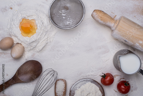 baking ingredients eggs  flour  sugar  butter  yeast. dough preparation. food background