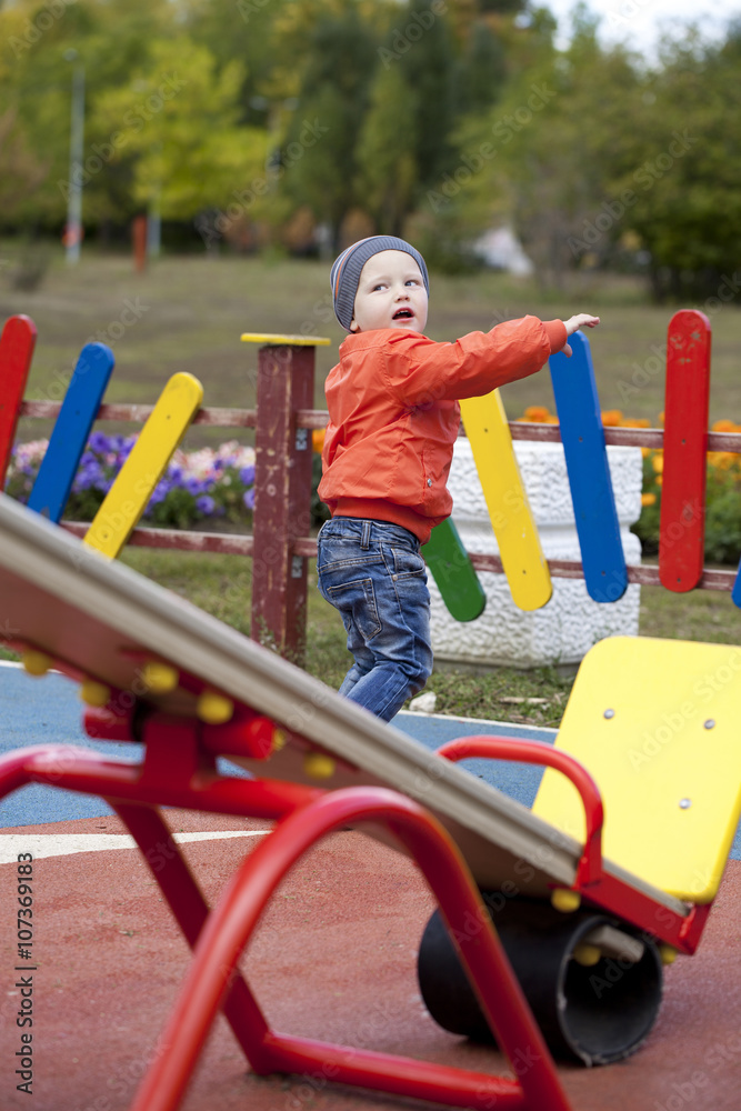 Little boy playing on the playground