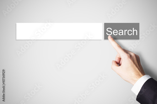 finger pushing grey web search button