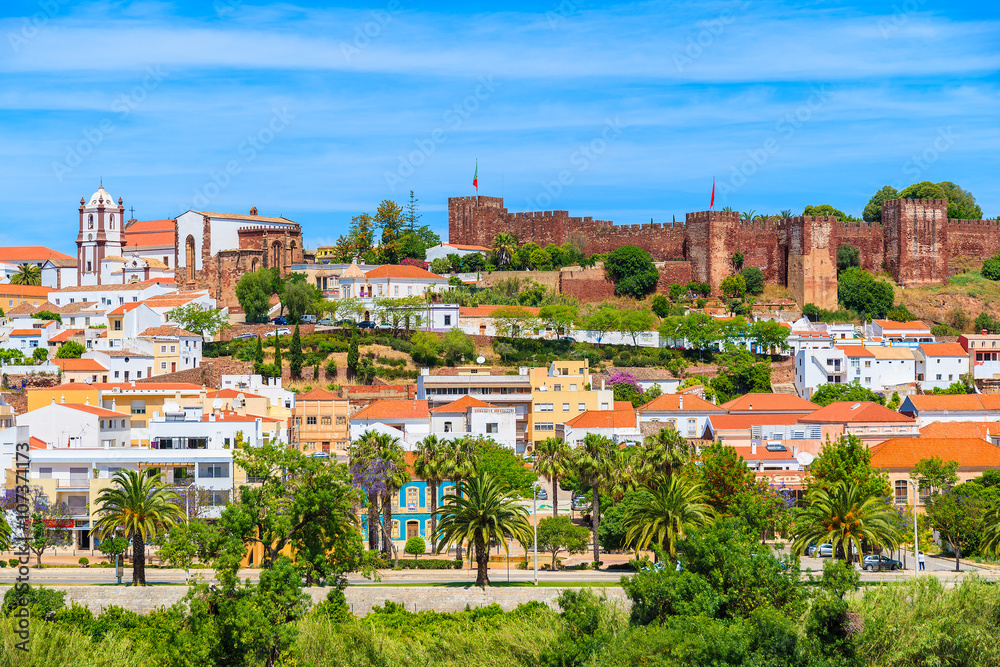 A view of Silves town buildings with famous castle and cathedral, Algarve region, Portugal